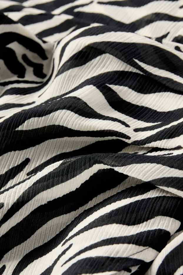 Dona - Faldilla - estampada - negre/blanc