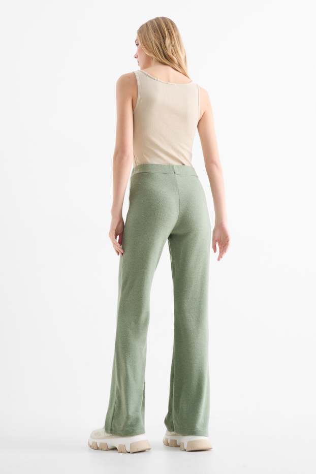 Damen - Flared Leggings - grün
