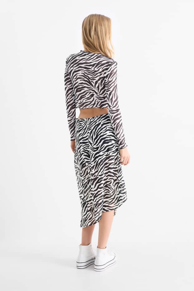 Dona - Faldilla - estampada - negre/blanc