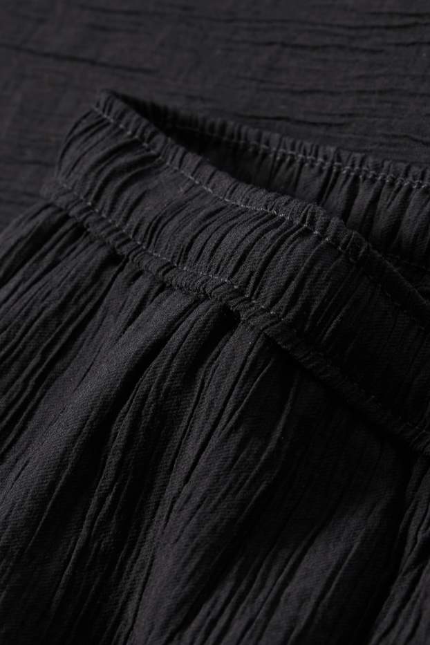 Donna - Pantaloni - vita media - gamba ampia - nero