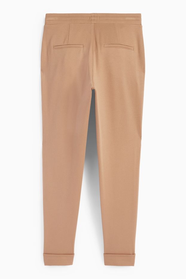 Dámské - Žerzejové kalhoty - mid waist - tapered fit - béžová