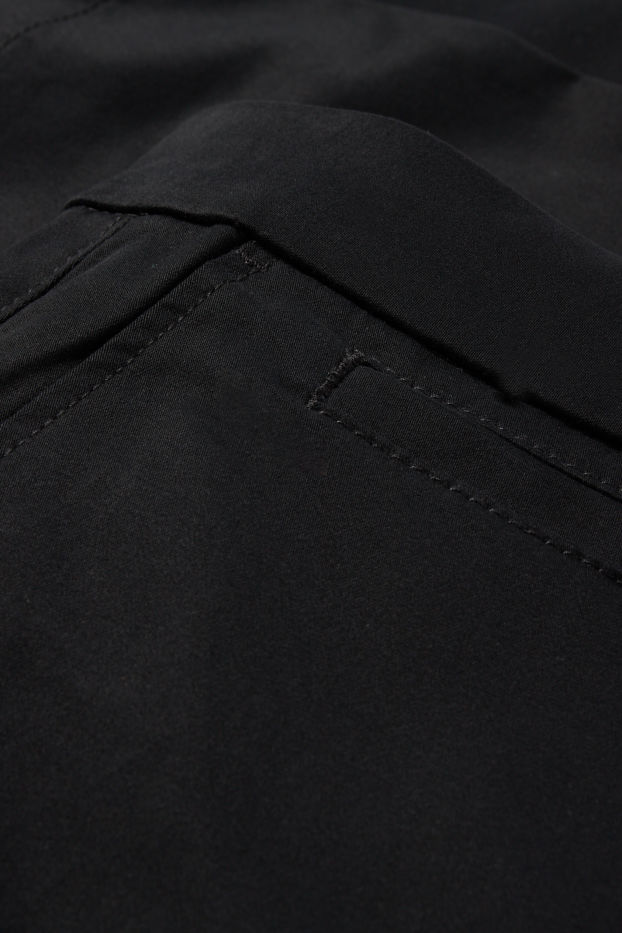 Femmes - Chino - mid waist - tapered fit - noir