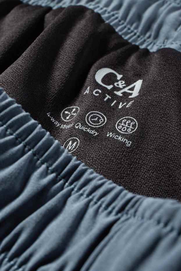 Hommes - Short de sport - 4 Way Stretch - bleu clair