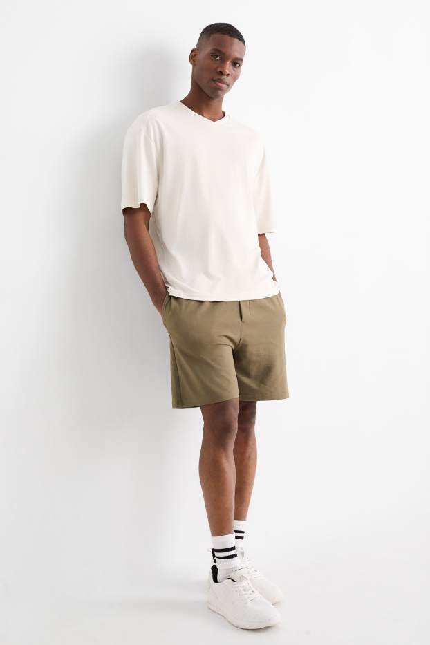 Home - Pantalons curts de xandall tècnics - verd fosc