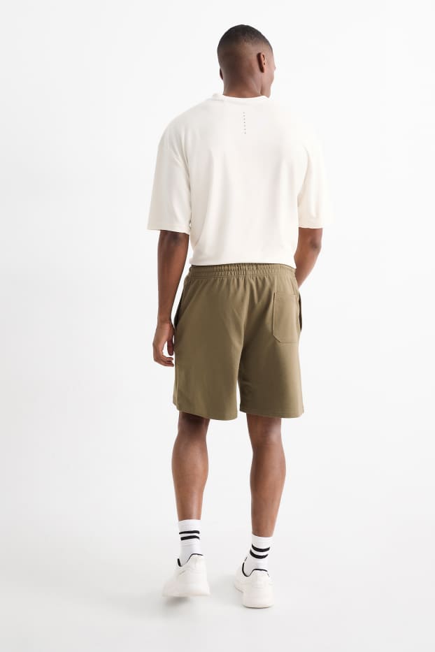 Home - Pantalons curts de xandall tècnics - verd fosc