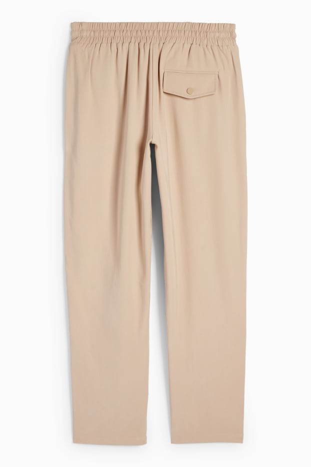 Dámské - Plátěné kalhoty - mid waist - tapered fit - světle béžová