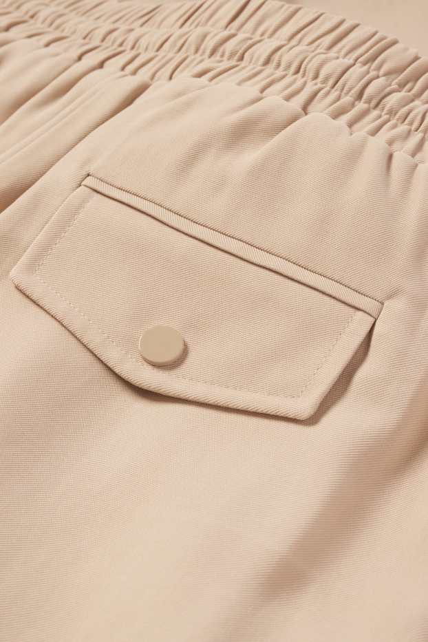 Dámské - Plátěné kalhoty - mid waist - tapered fit - světle béžová