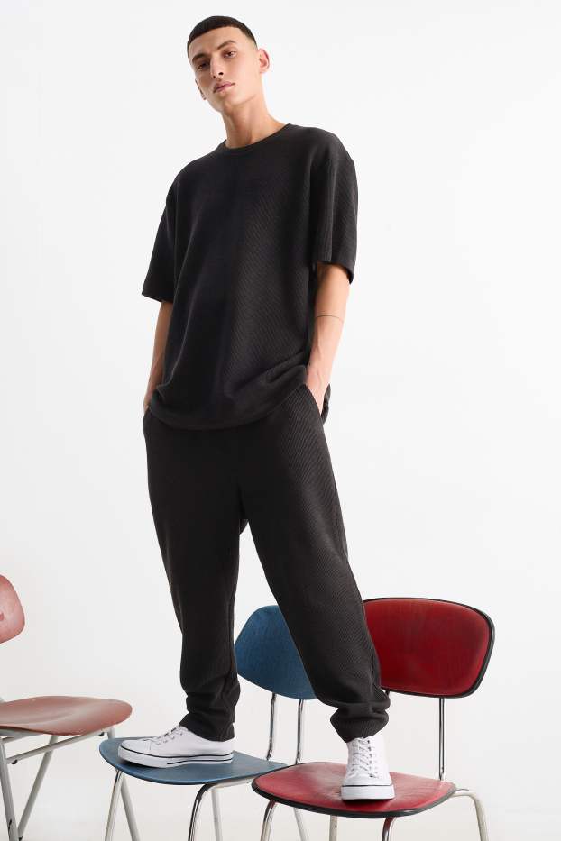 Bărbați - Pantaloni de trening - reiați - negru