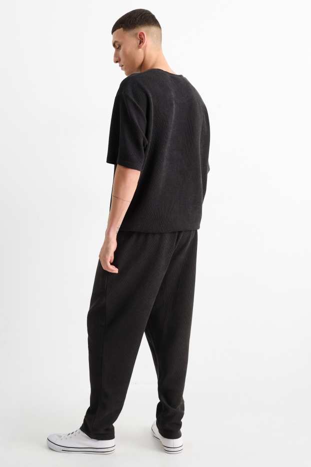 Bărbați - Pantaloni de trening - reiați - negru