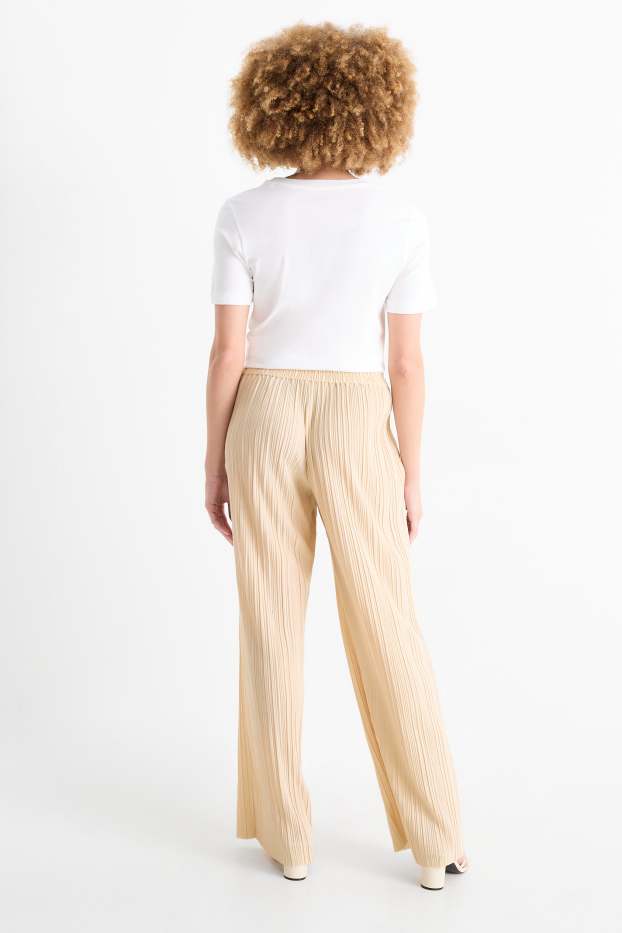 Dámské - Plisované kalhoty - high waist - wide leg - světle béžová