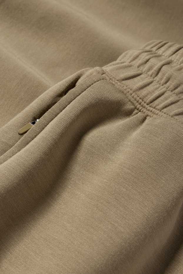 Women - Technical cargo joggers - green