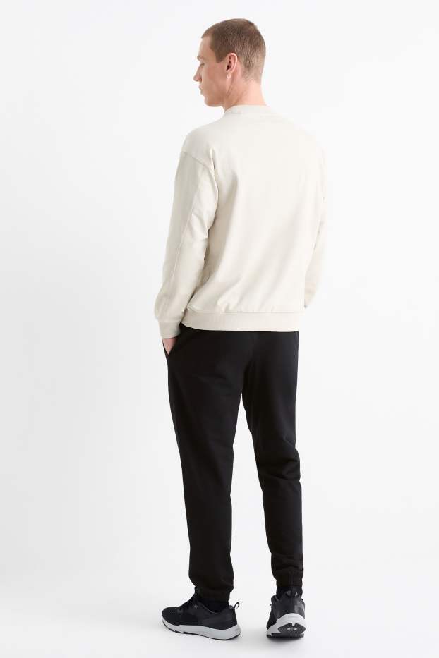 Men - Technical joggers - black