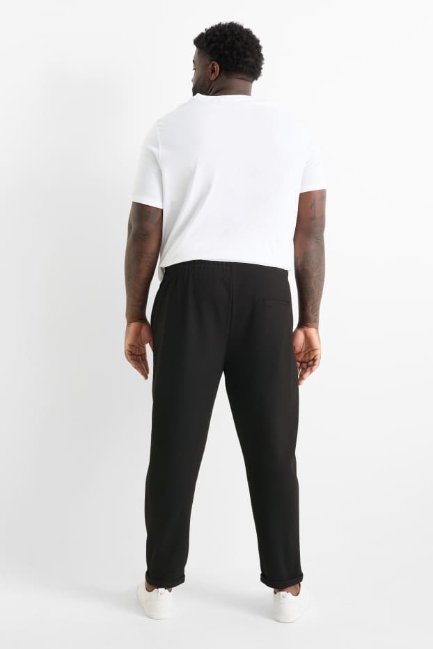 Bărbați - Pantaloni de trening - negru