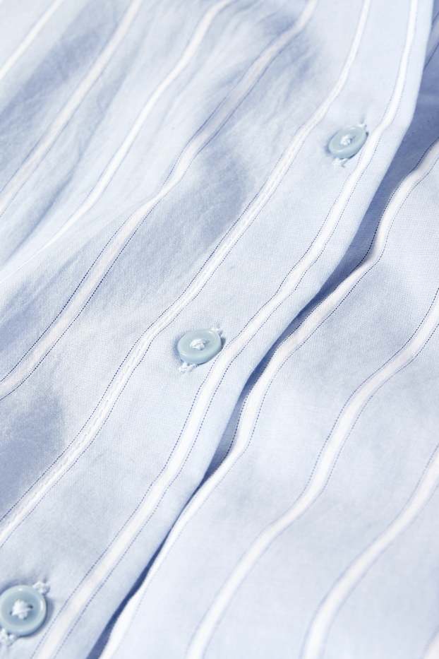 Dona - Brusa - de ratlles - blau clar