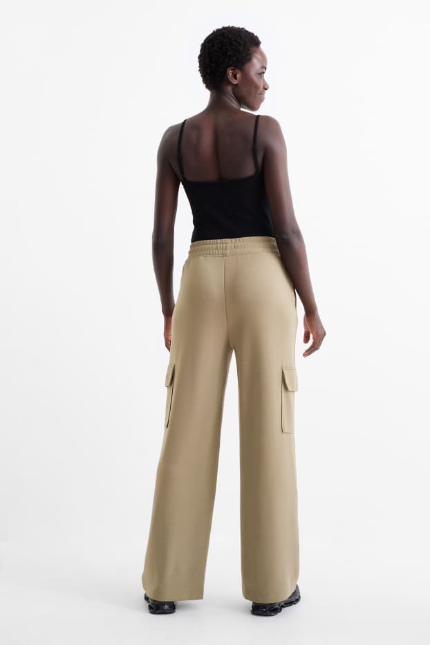 Women - Technical cargo joggers - green