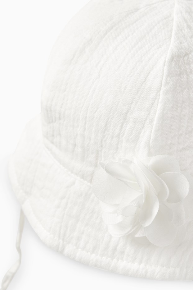 Baby: meisjes - Bloemetje - babyhoedje - crème wit