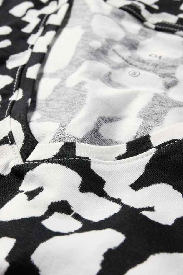 Damen - T-Shirt mit V-Ausschnitt - Leo-Print - schwarz / weiß
