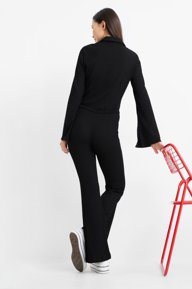 Donna - Pantaloni - vita media - flared - nero