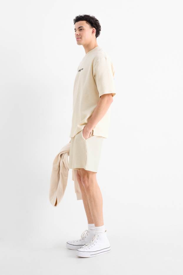 Uomo - Shorts - tessuto tramato - crema
