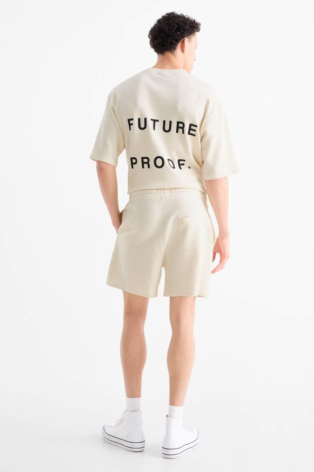 Uomo - Shorts - tessuto tramato - crema