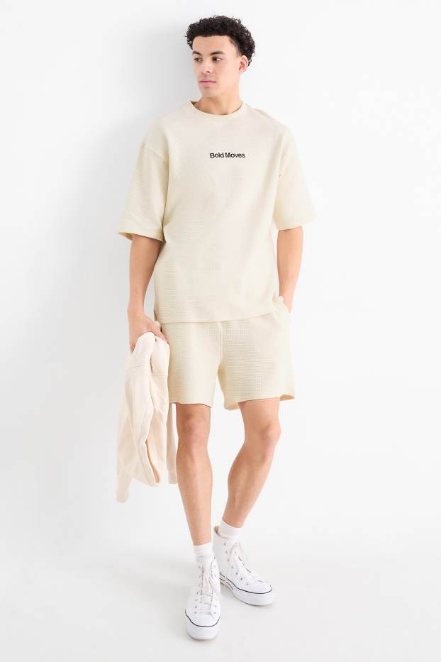 Uomo - Shorts - tessuto tramato - crema