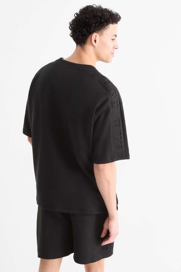 Hommes - T-shirt - oversize - noir