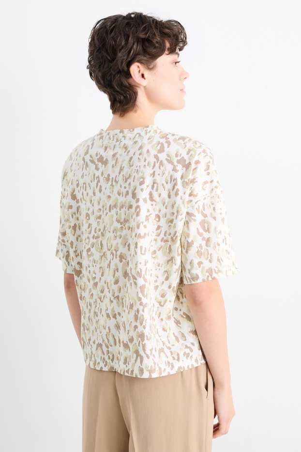 Femmes - T-Shirt - brillante - imprimé léopard - blanc / beige