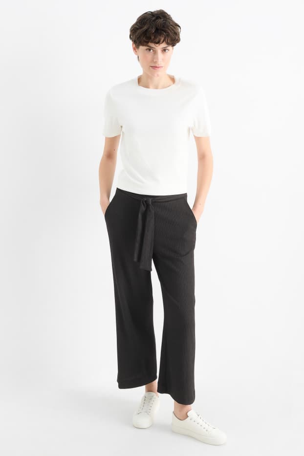 Femmes - Pantalon en jersey basique - mid waist - jambe large - finition texturée - noir
