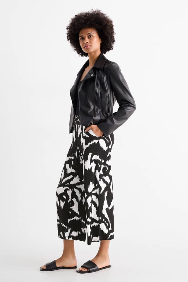 Dámské - Žerzejové kalhoty - high waist - wide leg - se vzorem - černá/bílá