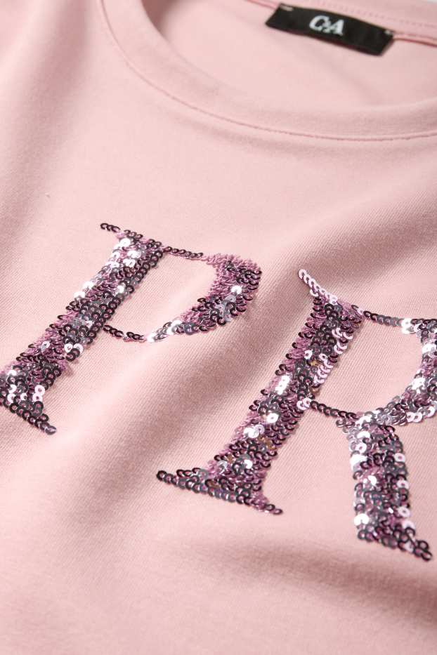 Dona - Dessuadora - efecte brillant - fúcsia