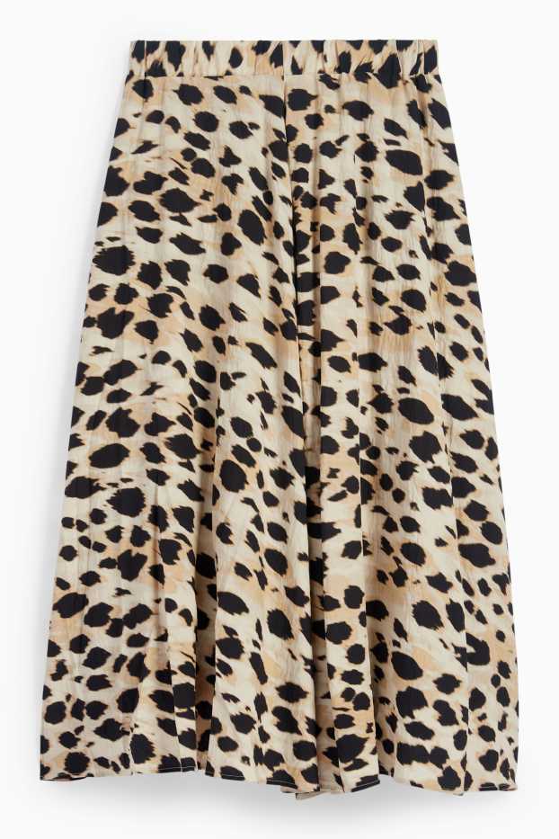 Dona - Faldilla - estampat de lleopard - beix