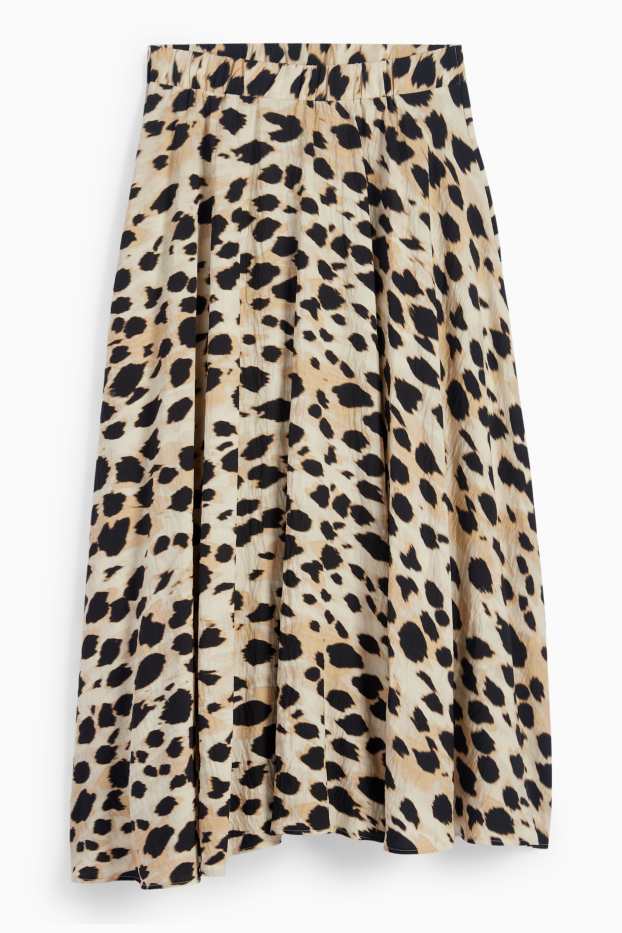 Dona - Faldilla - estampat de lleopard - beix