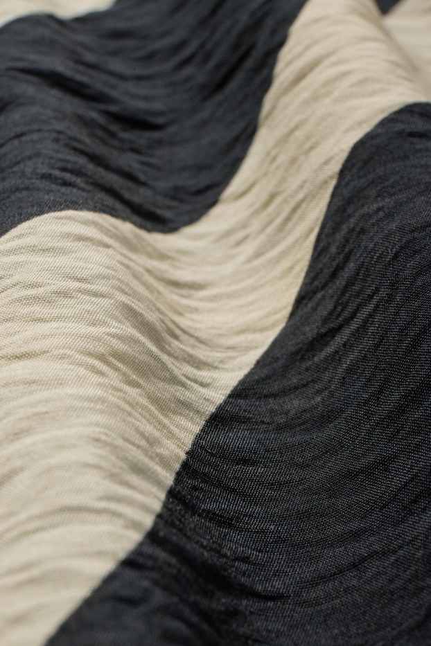 Dona - Faldilla - estampada - negre/beix