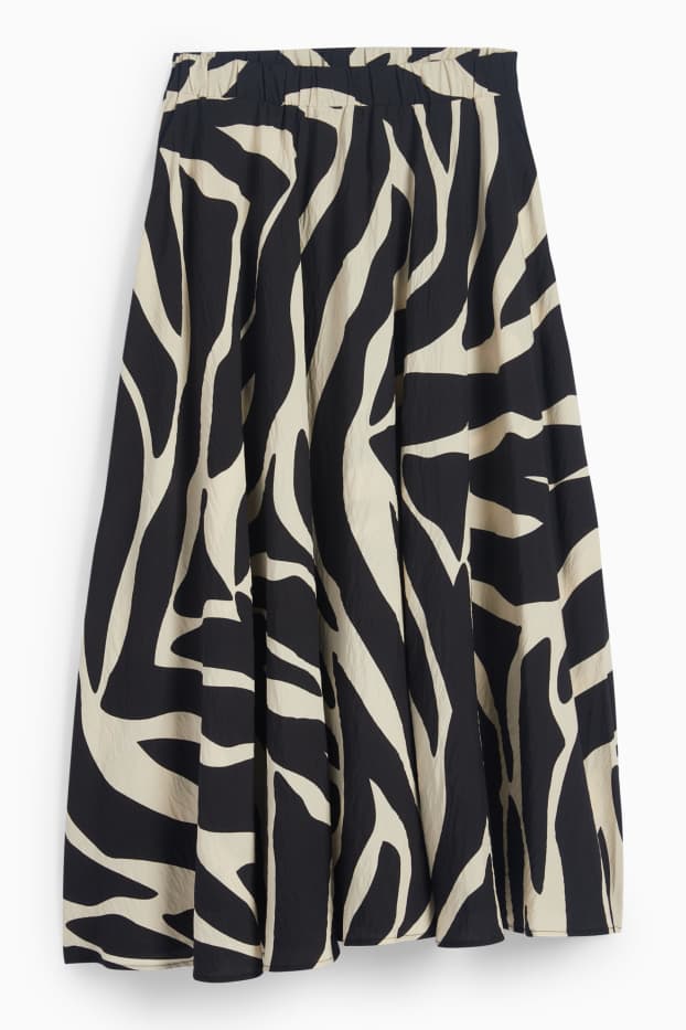 Dona - Faldilla - estampada - negre/beix