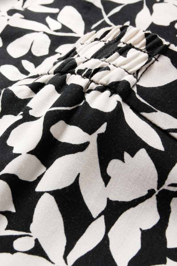 Femei - Pantaloni de stofă - talie înaltă - tapered fit - cu flori - negru / nej
