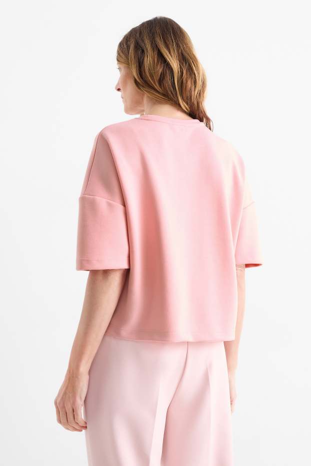 Dona - Dessuadora - efecte brillant - fúcsia