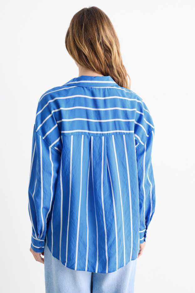 Dona - Brusa - de ratlles - blau