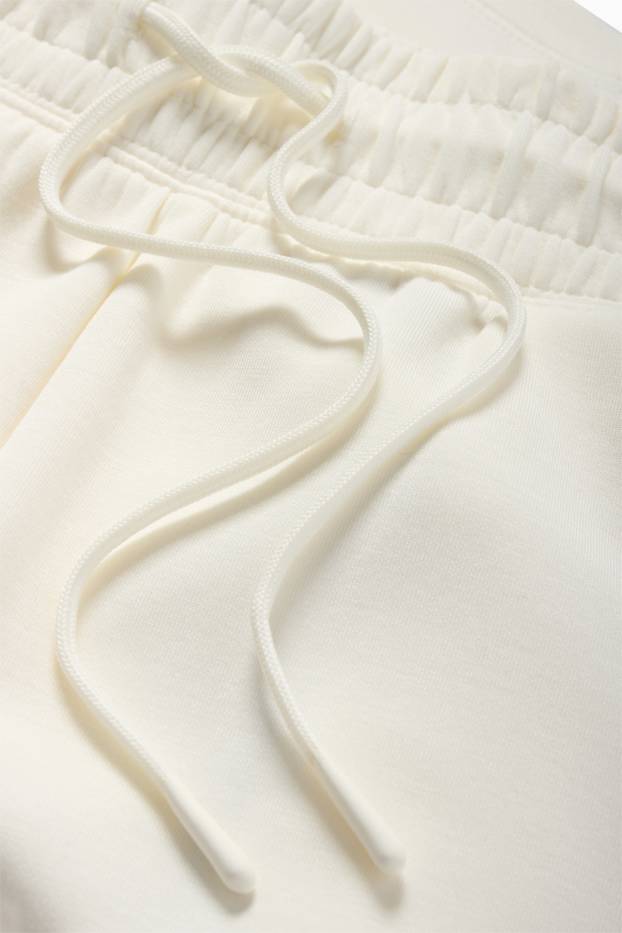 Dona - Pantalons curts tècnics - beix clar