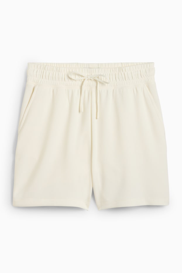 Dona - Pantalons curts tècnics - beix clar
