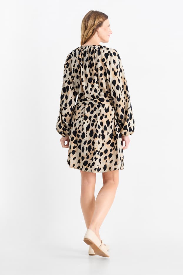 Dámské - Áčkové šaty - s leopardím vzorem - béžová