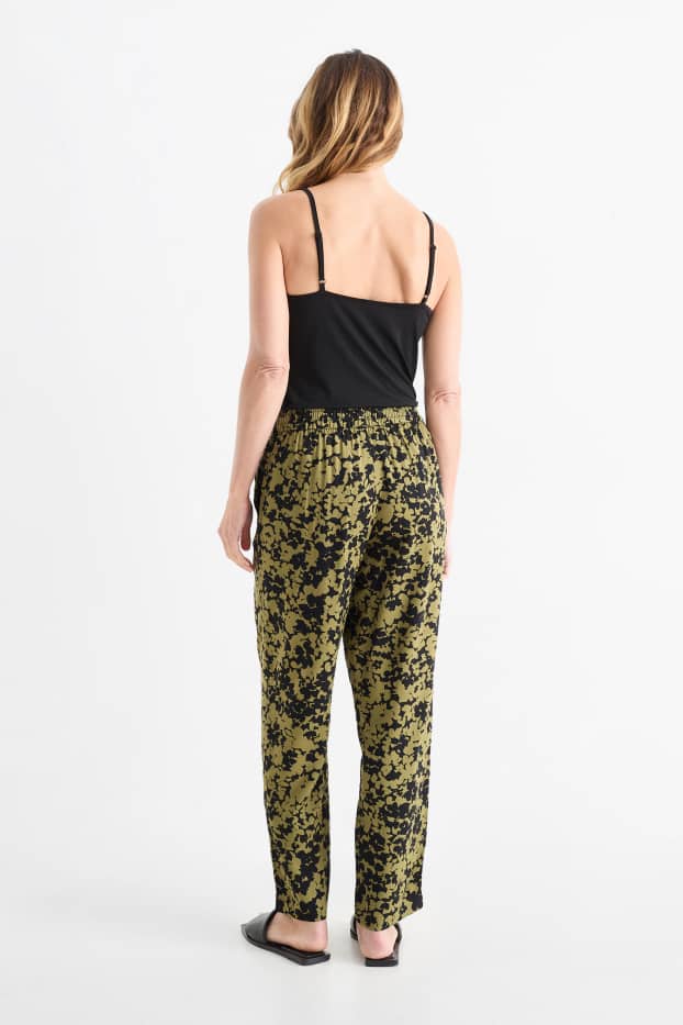 Femei - Pantaloni de stofă - talie înaltă - tapered fit - cu flori - verde închis / negru