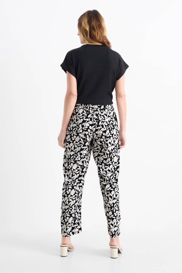 Femei - Pantaloni de stofă - talie înaltă - tapered fit - cu flori - negru / nej