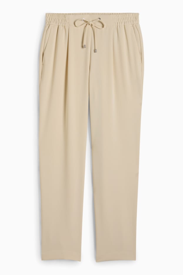 Dona - Pantalons de tela - mid waist - tapered fit - beix clar