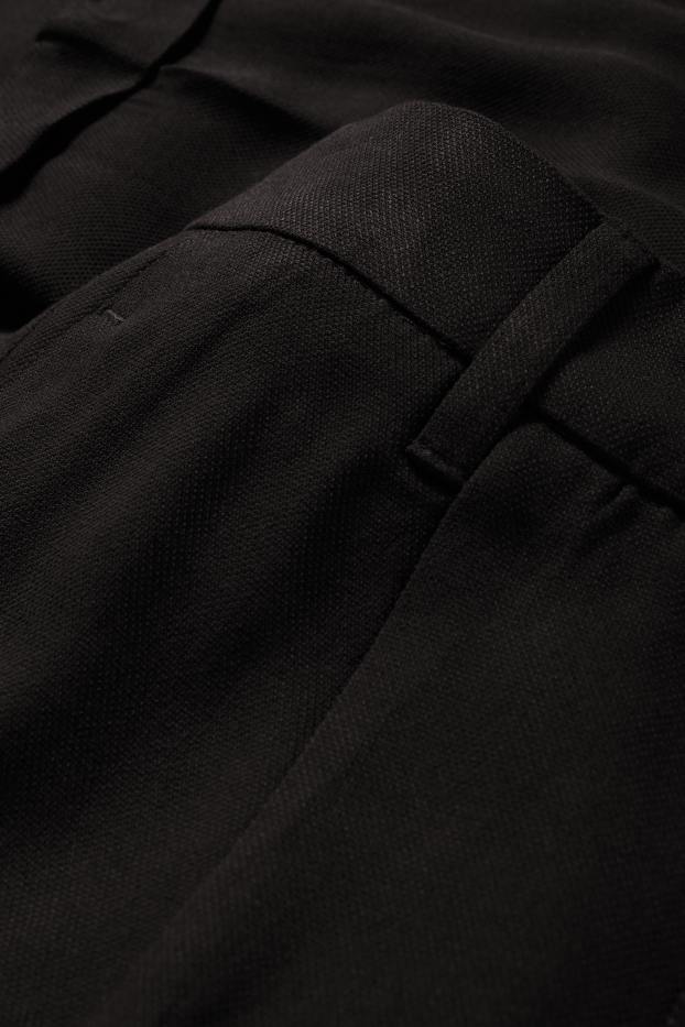 Femmes - Pantalon en toile - mid waist - tapered fit - noir