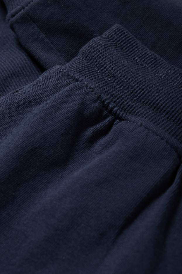 Děti - chlapci - Teplákové kalhoty - tmavomodrá