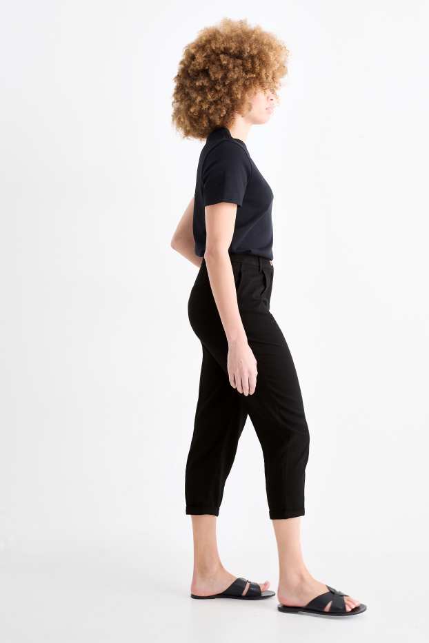 Femmes - Pantalon en toile - mid waist - tapered fit - noir