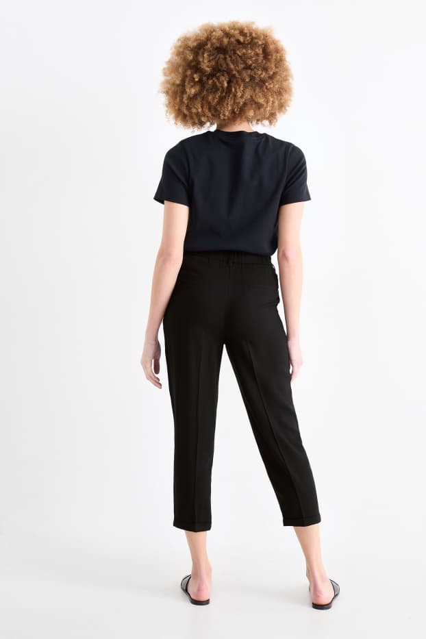 Femmes - Pantalon en toile - mid waist - tapered fit - noir