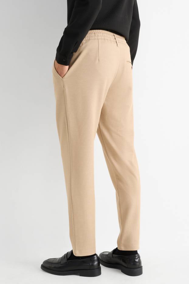 Hommes - Chino - tapered fit - couleur sable