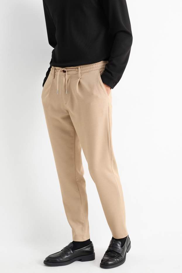 Hommes - Chino - tapered fit - couleur sable