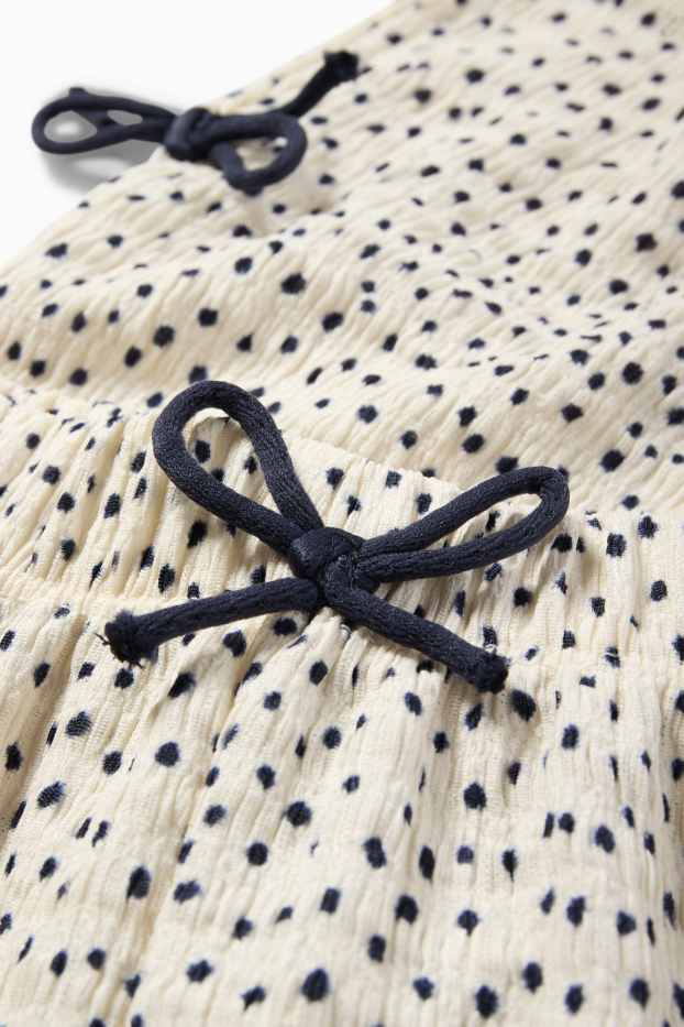 Kinderen: meisjes - Jersey broek - met stippen - met structuur - crème wit